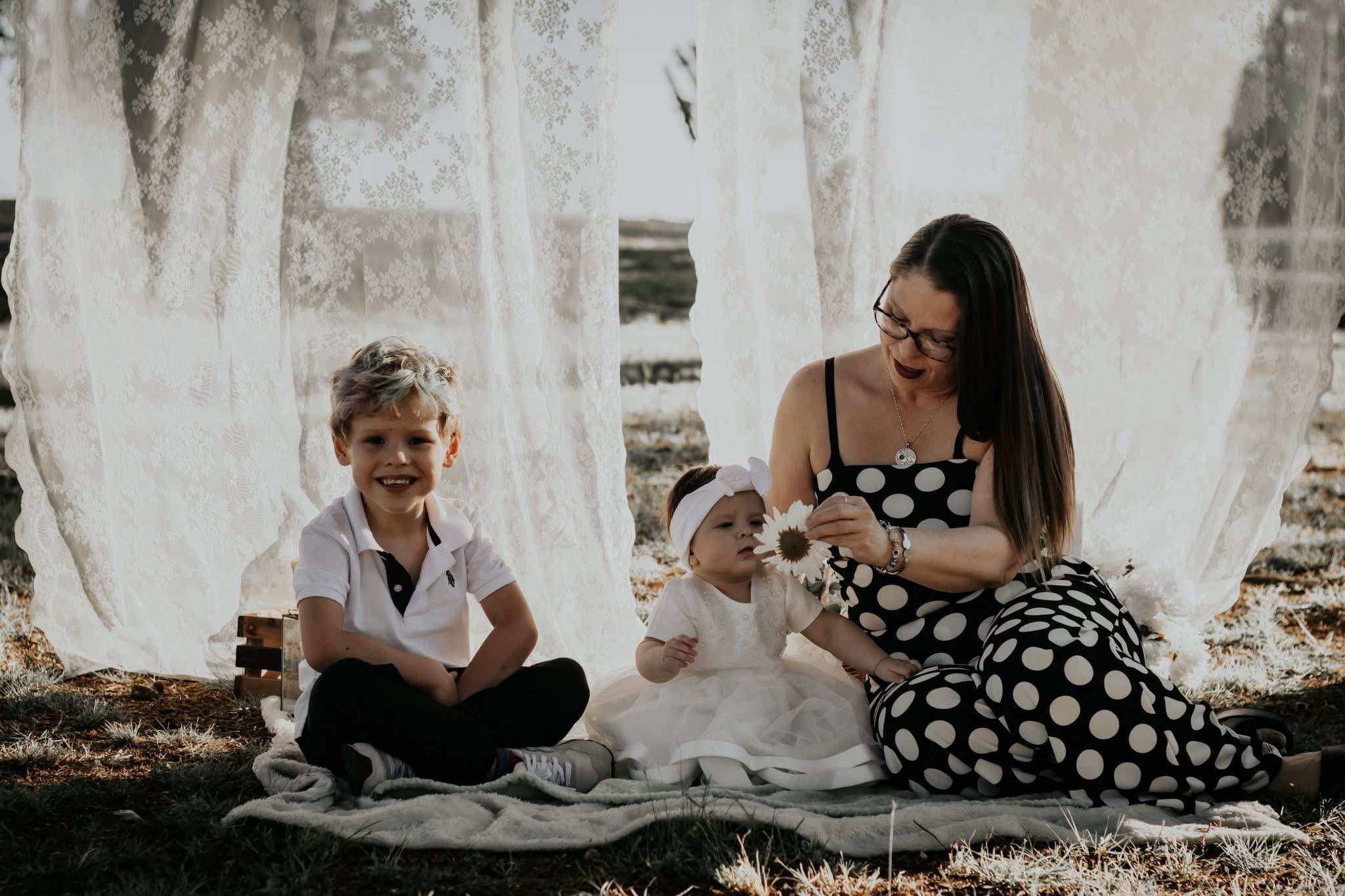 Mother spending a relaxed moment with her children outdoors
