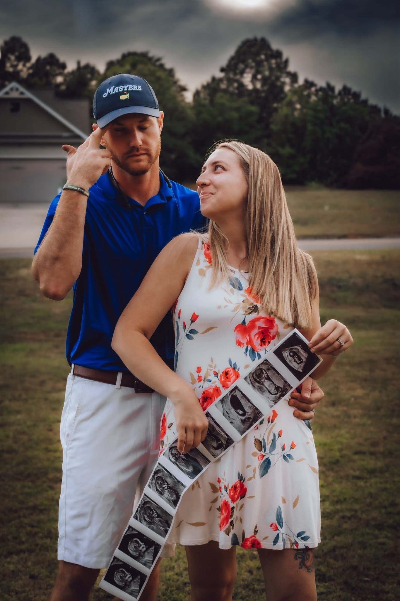 Expecting couple celebrating a new chapter together