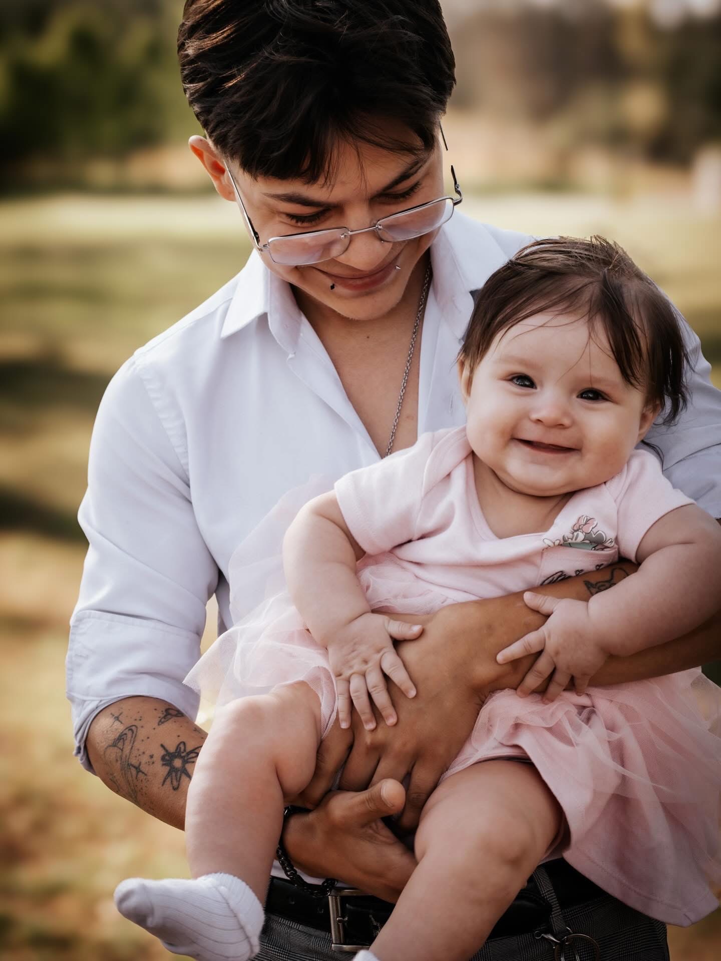 Tender moment between a parent and baby